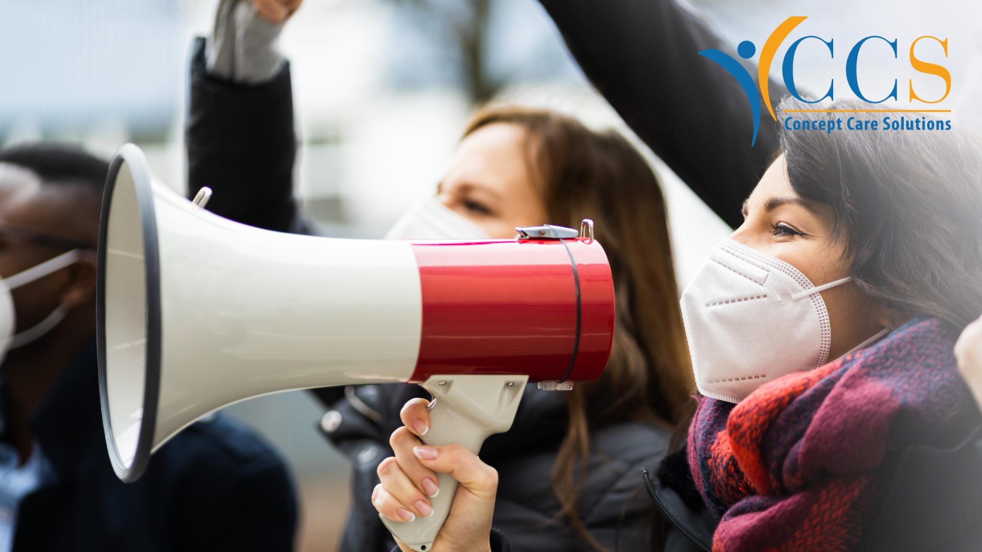 Doctor protesting during UK strikes 2026 highlighting NHS staffing shortages and pressure on healthcare workers